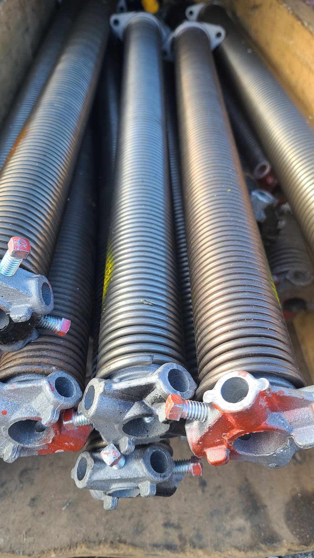 replacing garage door spring system at home